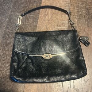 Coach black leather shoulder bag with gold accents